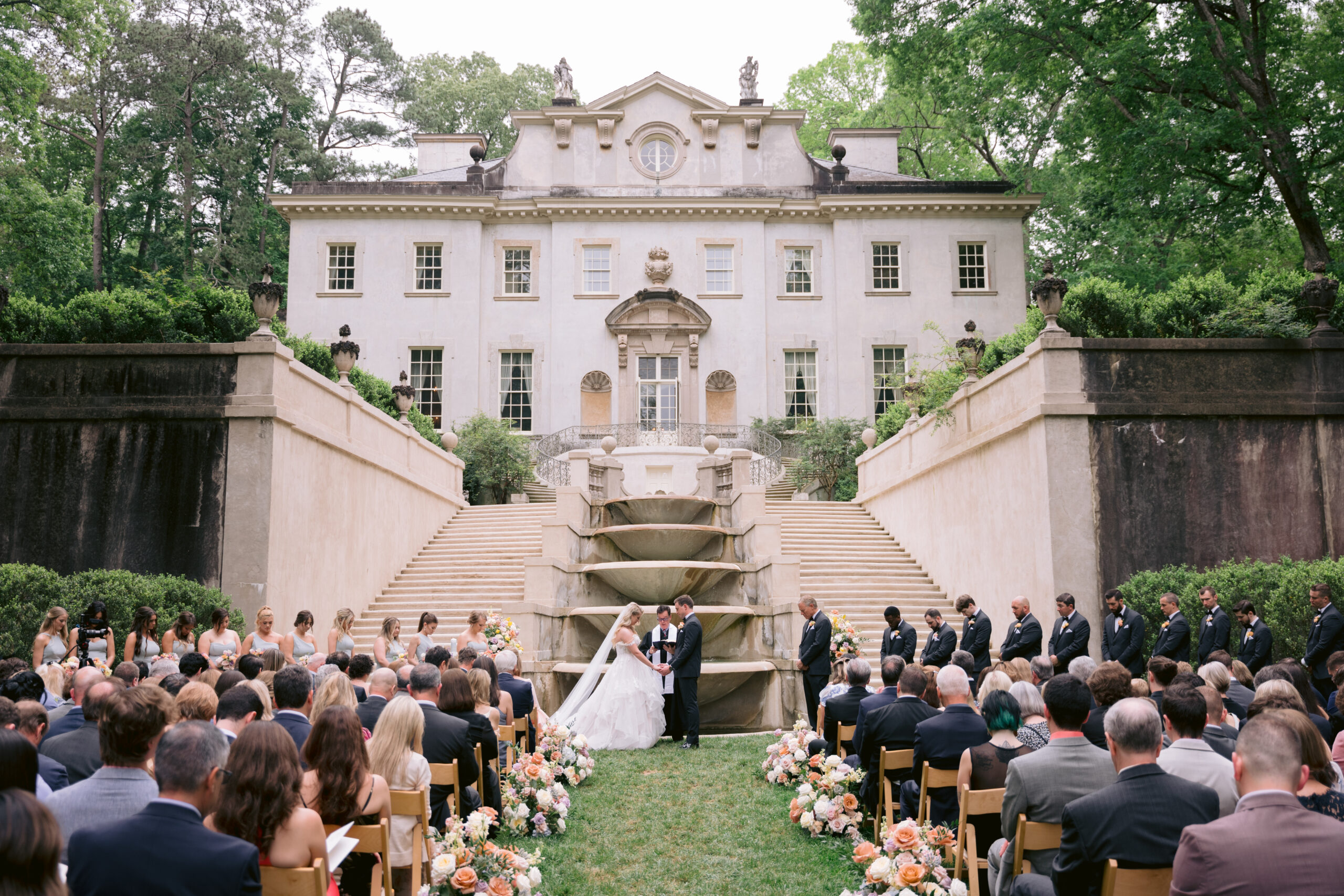 Wedding ceremony on the front lawn of the Swan House of the Atlanta History Center.