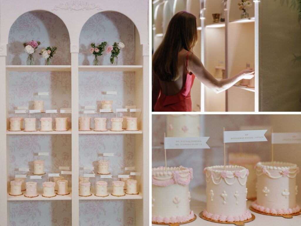 Display of french-inspired petite cakes with guest names and table numbers on cake toppers